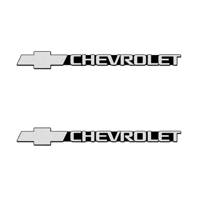 A black and silver Chevrolet emblem featuring a stylized bowtie design.