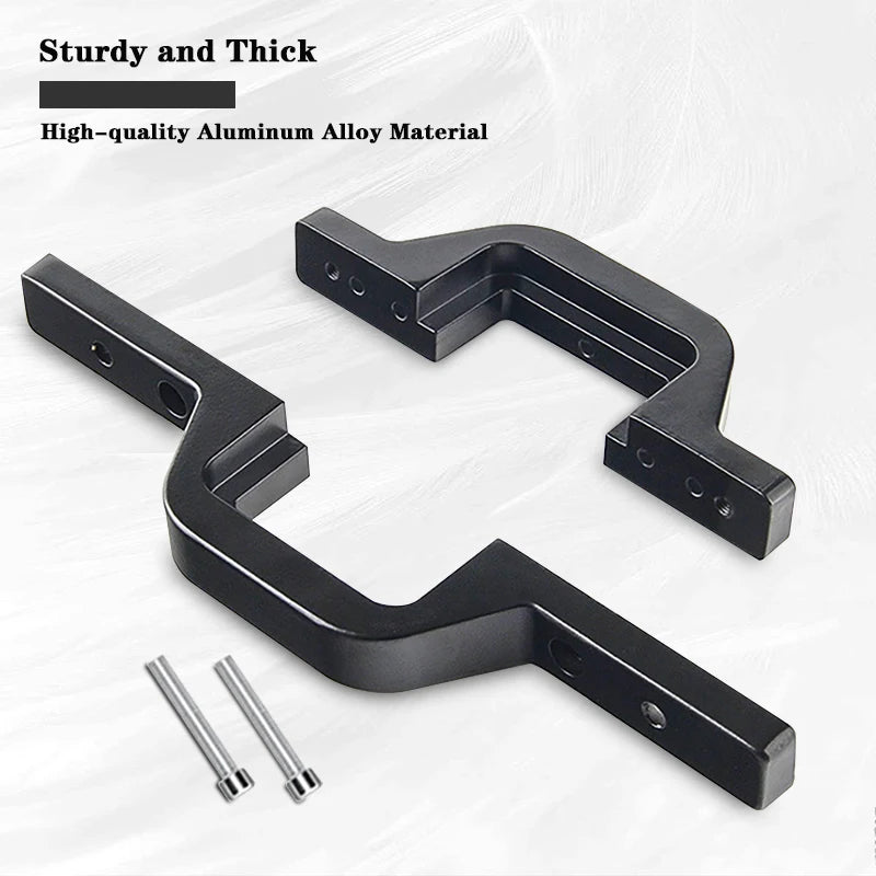 Black aluminum alloy pod mount brackets for a tow hitch, shown with mounting bolts.