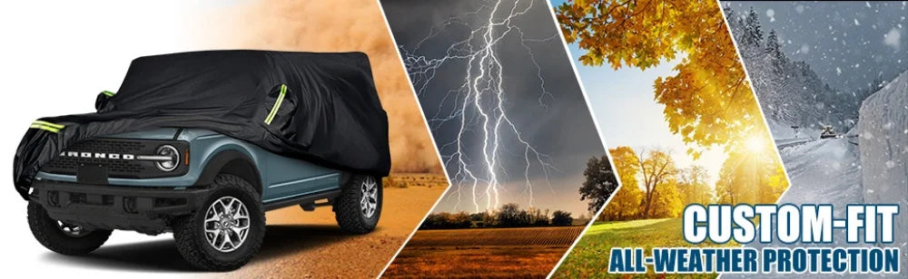 Dunkelgrauer Ford Bronco mit schwarzer Überzug, vor Hintergrund aus Blitz und Herbstlaub