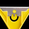 A close-up view of a yellow plastic razor scraper with a silver blade used for cleaning glass or tile surfaces.