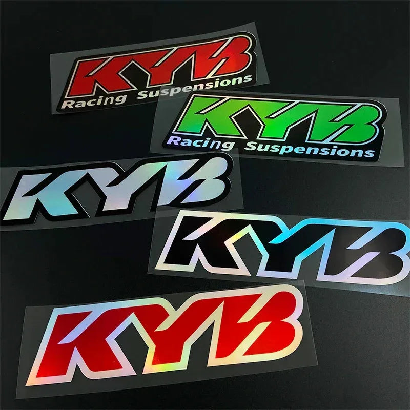 A collection of various colored and styled KYB racing suspension decals for motorcycles.