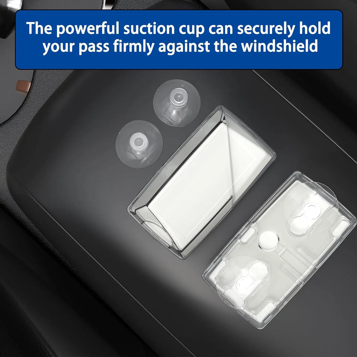 A clear universal EZ-Pass holder with suction cups is shown resting on a car dashboard surface.