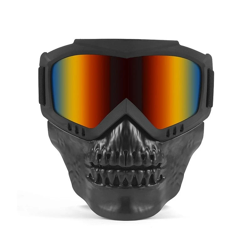 A black protective mask with orange-tinted goggles and a sculpted facial design.