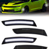 A bright lime green Chevrolet Camaro with aftermarket LED turn signal lights installed.