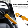 A yellow heavy duty adjustable steering wheel lock is shown installed on a car steering wheel.
