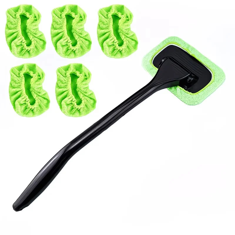 A set of green, fuzzy cleaning brushes with a long handle for car window cleaning.