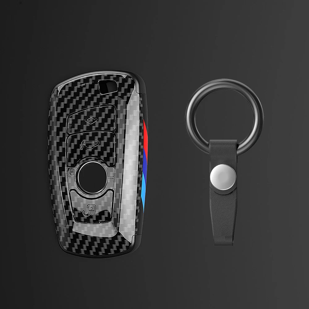 Juego de funda para llave de coche de fibra de carbono negra con llavero plateado y argolla negra.