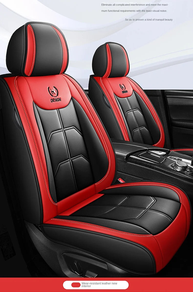 A pair of black and red leather car seat covers shown in a vehicle interior.