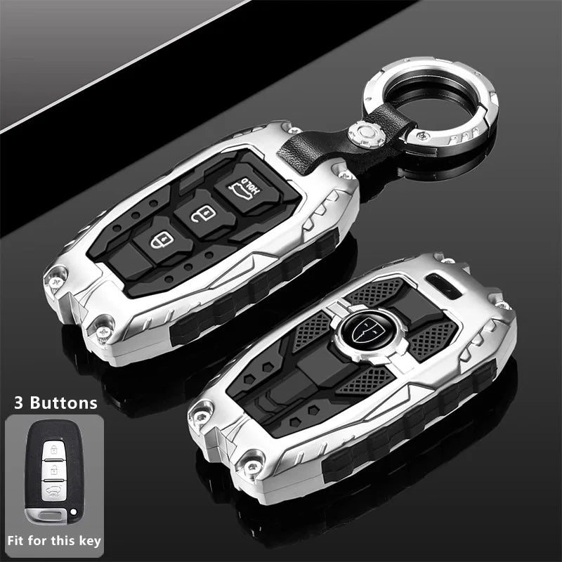 Silver universal car key fob cover with a black grip and a metal ring, shown against a dark background.