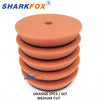 Set of five orange medium cut polishing sponge pads for car buffing