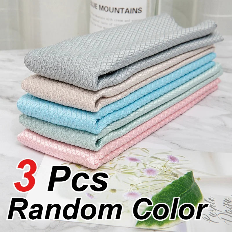 A stack of three reusable glass cleaning cloths in various pastel colors, including light blue, pink, and mint green.