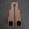 A pair of brown leather car headrest hooks with metal attachments for storage organization.