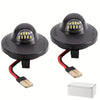 A pair of high brightness automotive LED license plate lights with black housings and wiring connectors.