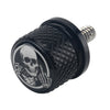 Black aftermarket motorcycle seat and fender bolts with a skull design