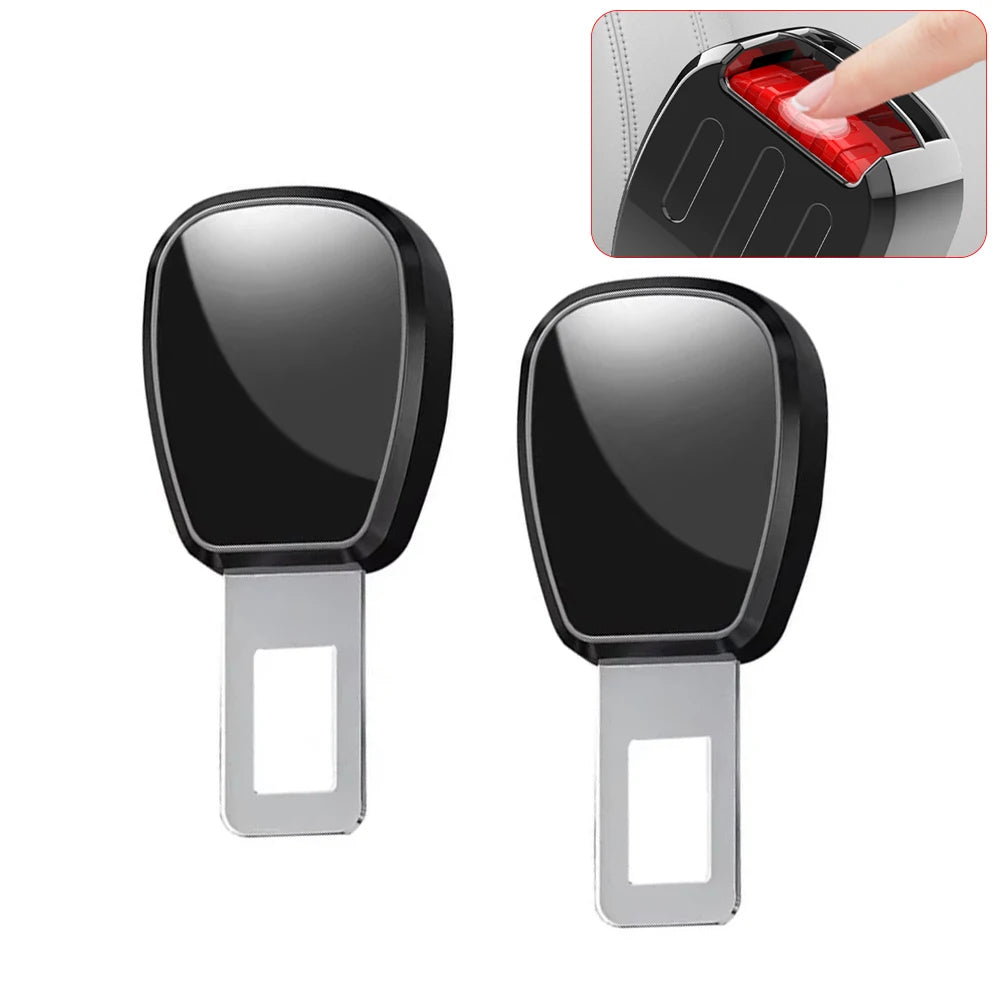 A pair of black car seat belt extenders with silver quick-release buckles shown next to an inset demonstrating the use.