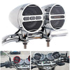 Chrome motorcycle Bluetooth speaker system with grille covers mounted on the handlebars