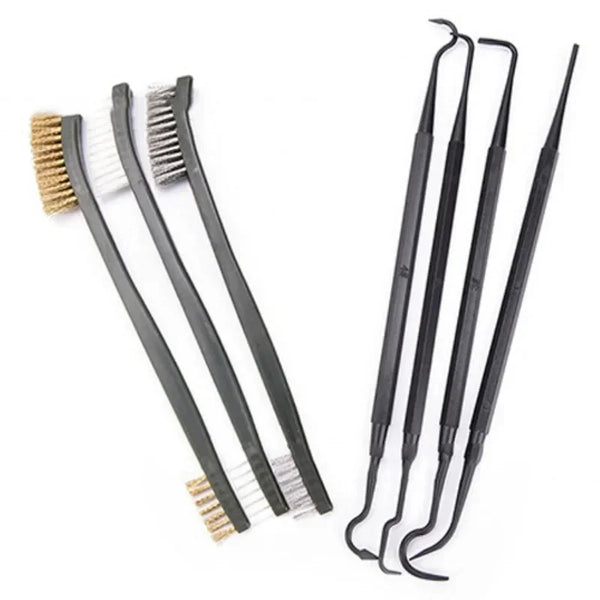 A set of seven black detailing brushes and picks for car cleaning.