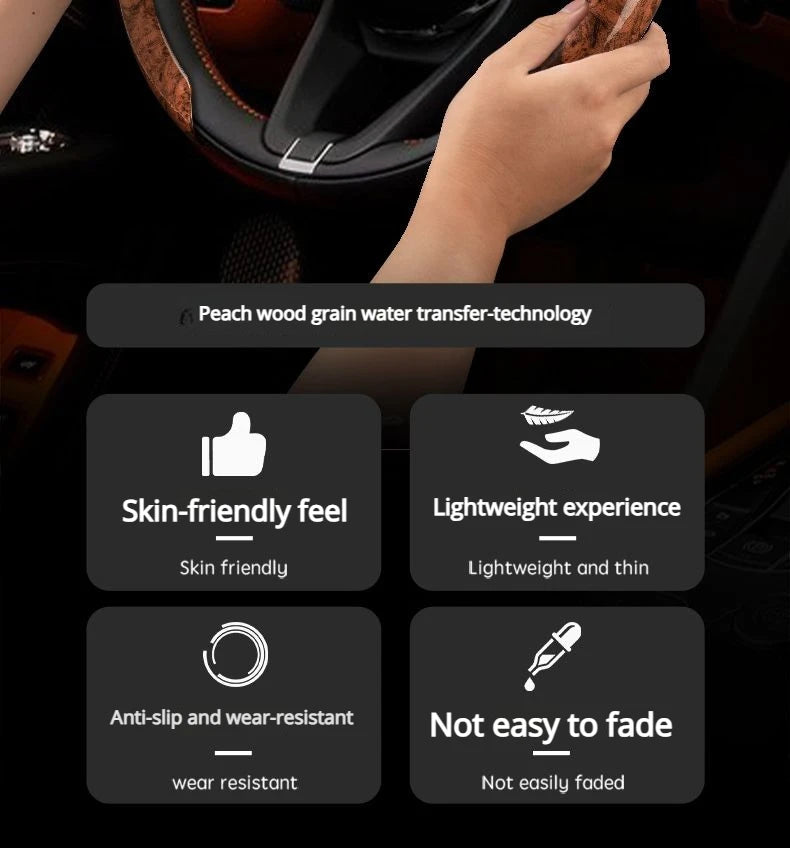 A close-up of a hand holding an ultra-thin anti-slip steering wheel cover with peach wood grain texture.
