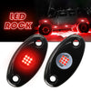 Two LED rock lights are shown, featuring red illumination and a visible light pattern.
