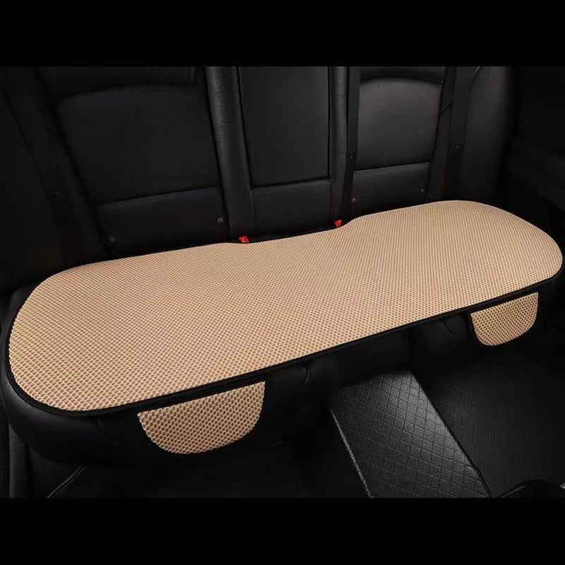 A beige breathable ice silk car seat cushion is shown installed in a black car interior.