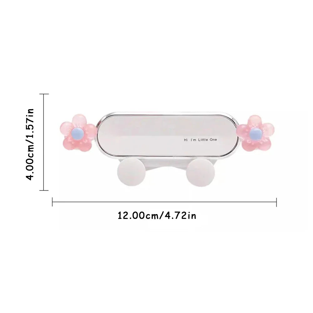 Support de téléphone pour voiture rose, avec corps transparent et accents floraux.