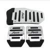 A set of aluminum sports pedal covers for a car pedal.