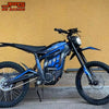 A blue and black motorcycle kit featuring a mudguard and protection components displayed against a yellow wall.