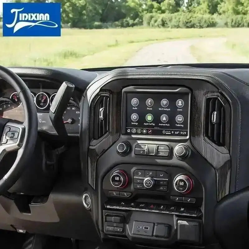 Interior view of a truck dashboard showing the center console navigation panel trim cover.