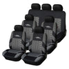 A set of black universal car seat covers with gray patterned fabric for multiple seats.
