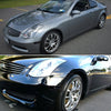 A side view of a gray Infiniti G35 sports coupe showing smoked lens side marker light housings.