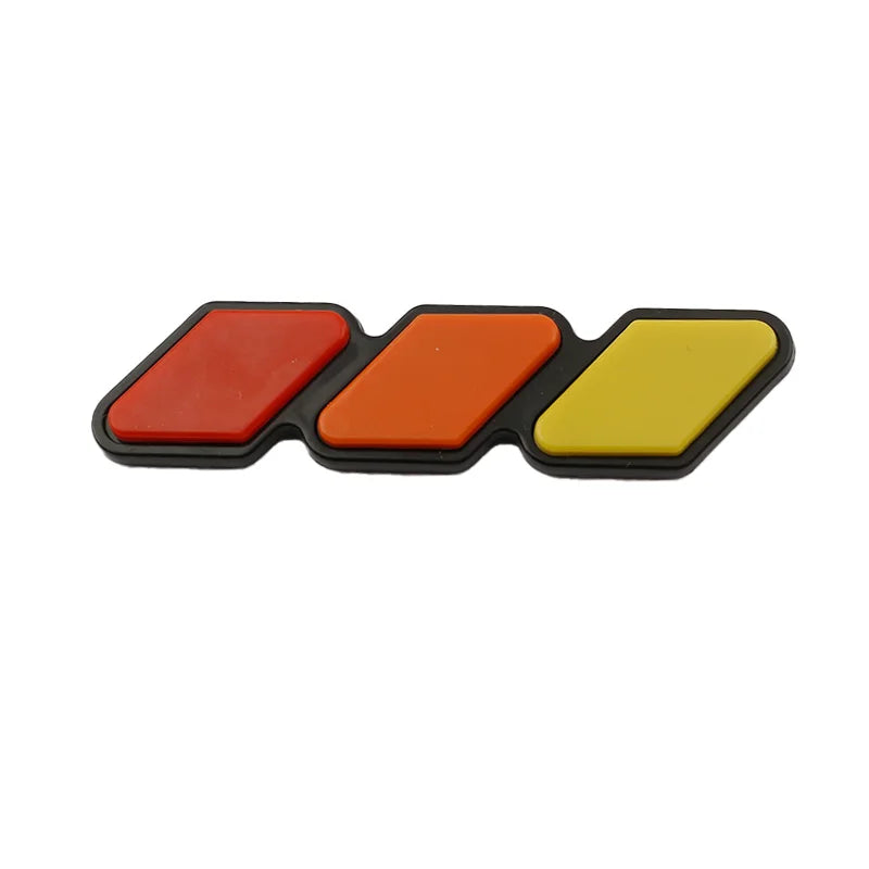 Three rectangular decals in red, orange, and yellow for car grill decoration