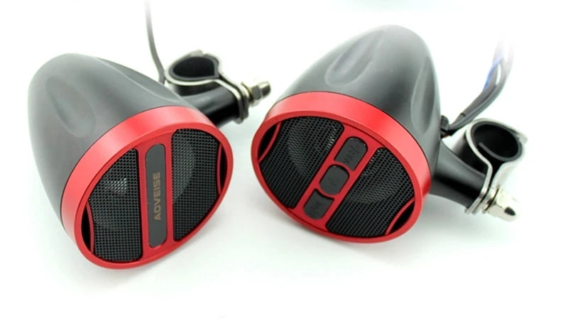 A pair of black and red motorcycle Bluetooth speaker systems with FM radio and USB connectivity.