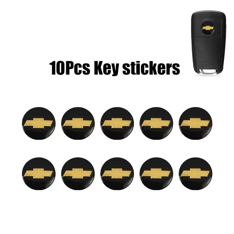 A set of ten black aluminum Chevrolet key emblem stickers.
