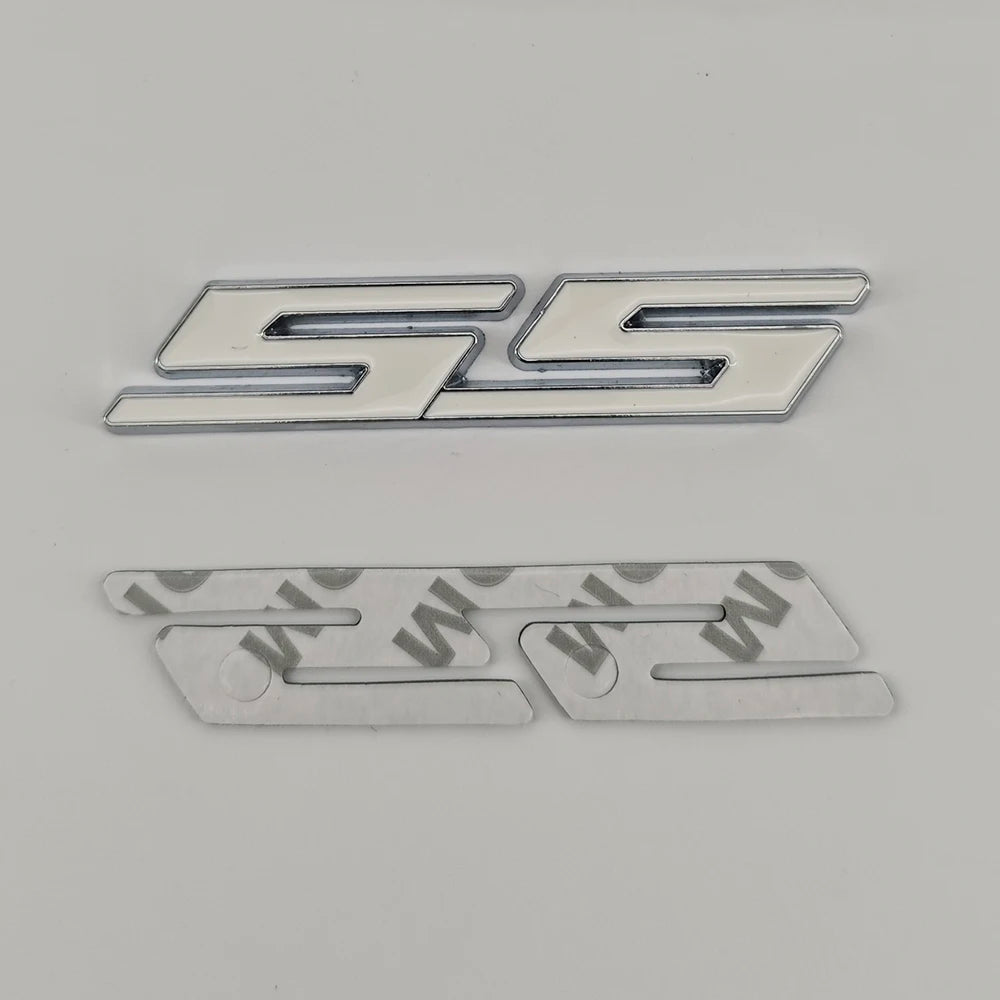 Silver metal emblem badge featuring the SS/RS design for Chevrolet vehicles