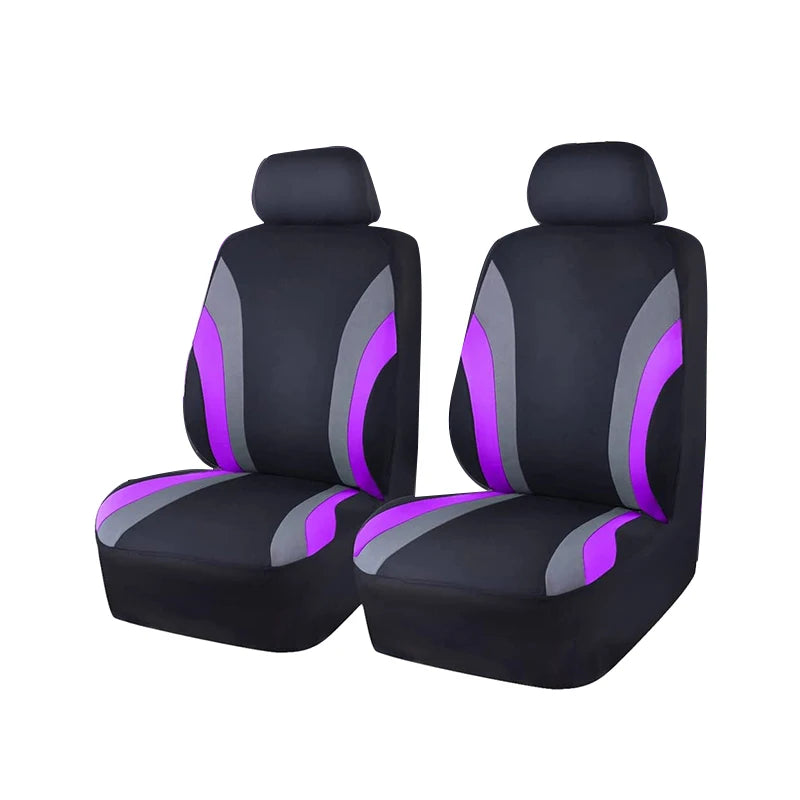 A pair of black car seat covers with purple accents shown from the side.