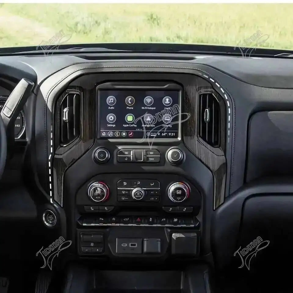 Interior view of a vehicle's center console navigation panel trim cover for Chevy Silverado and GMC Sierra.