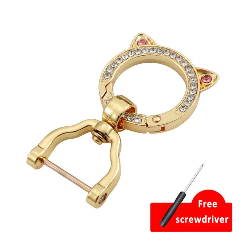 Gold-toned TPU car key fob cover with clear crystal accents and a screwdriver included