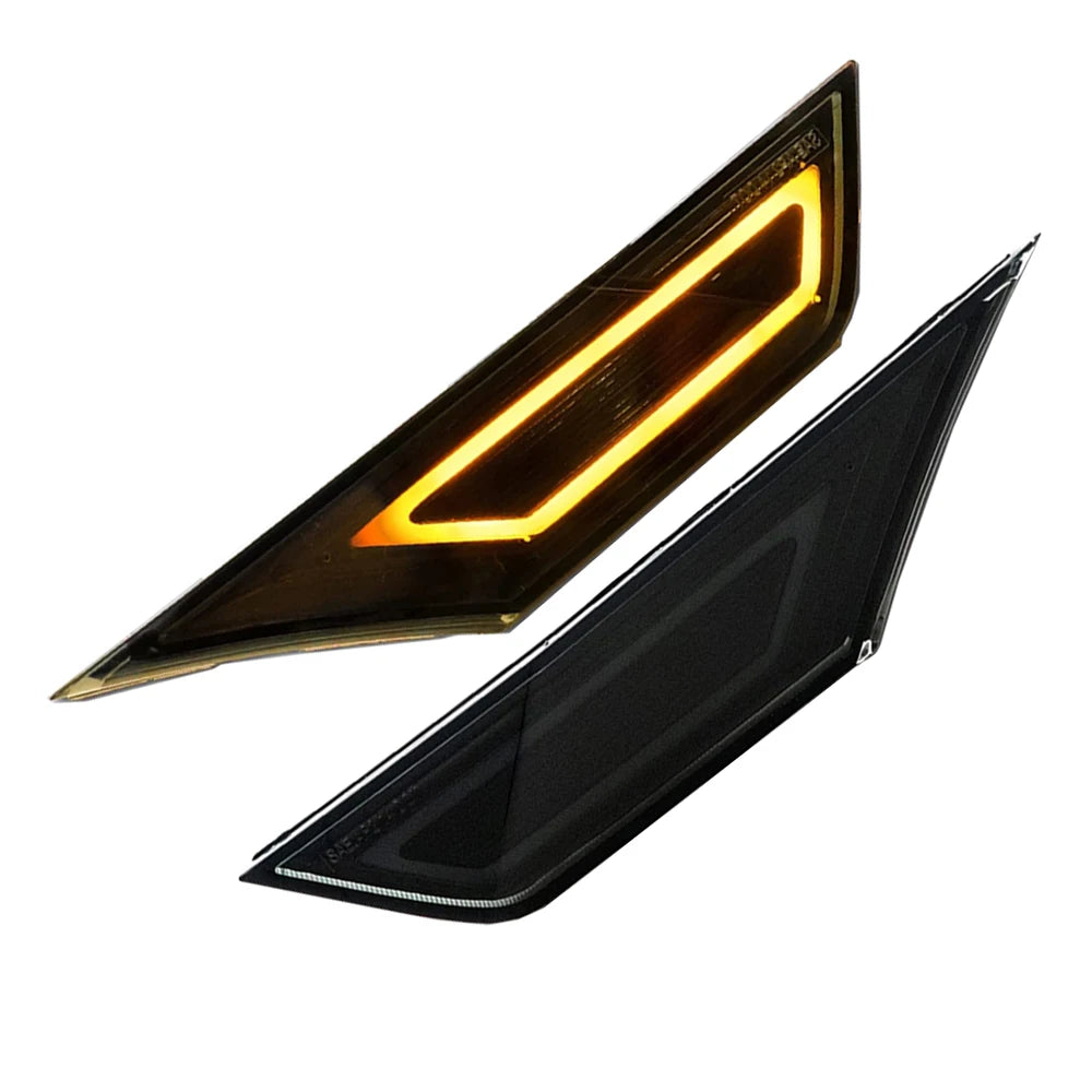 A close-up view of LED side marker lights for a Honda Civic, showing the illuminated amber light within a black housing.
