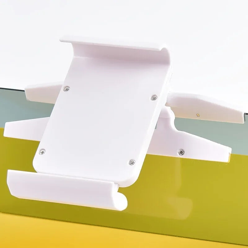 A white HD anti-glare car sun visor with dual-purpose vision lenses mounted on a yellow surface.