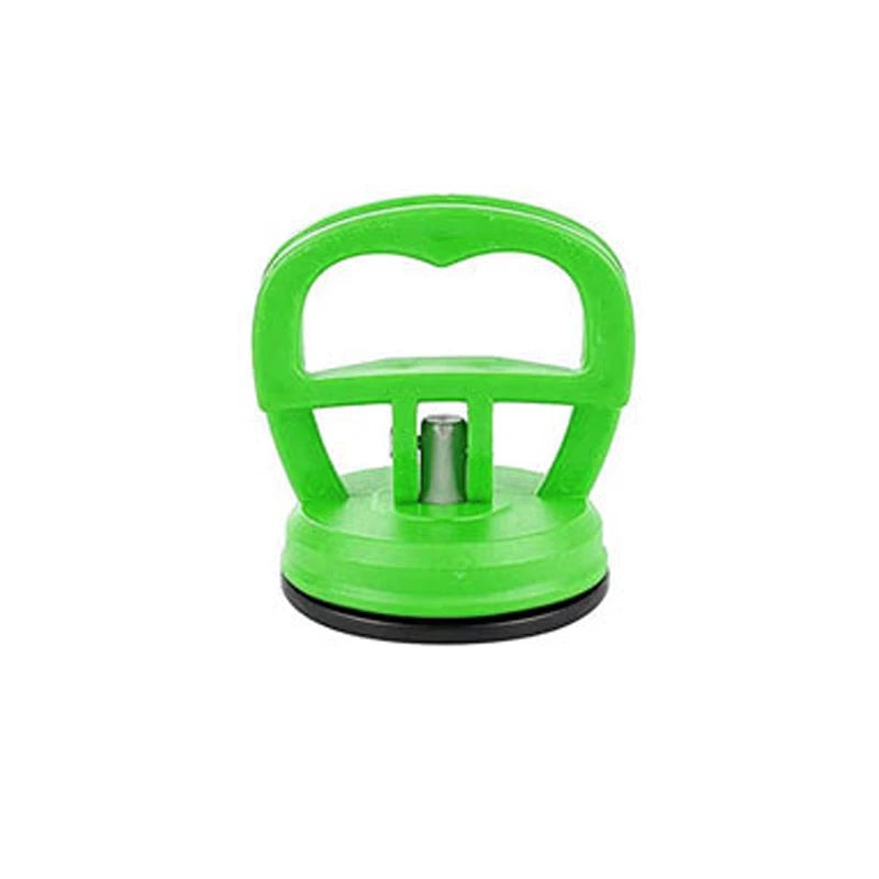 Green car dent remover puller with a handle and suction cup mechanism