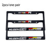Two black license plate frames with MUGEN branding and power text