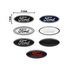 A set of five Ford aluminum hood and trunk emblem badges or stickers in various finishes.