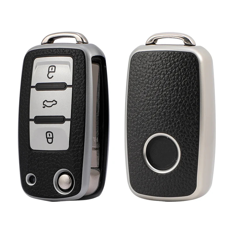 A black and silver TPU leather car key case for Volkswagen, Skoda, and other vehicles.