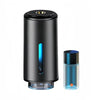 A sleek black aroma diffuser with a blue light feature and a clear glass bottle for car air freshener.