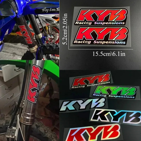 Close-up view of KYB racing suspension decals and components for motorcycle forks.