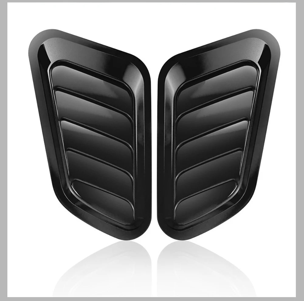 Black carbon fiber car hood scoop vent trim piece.