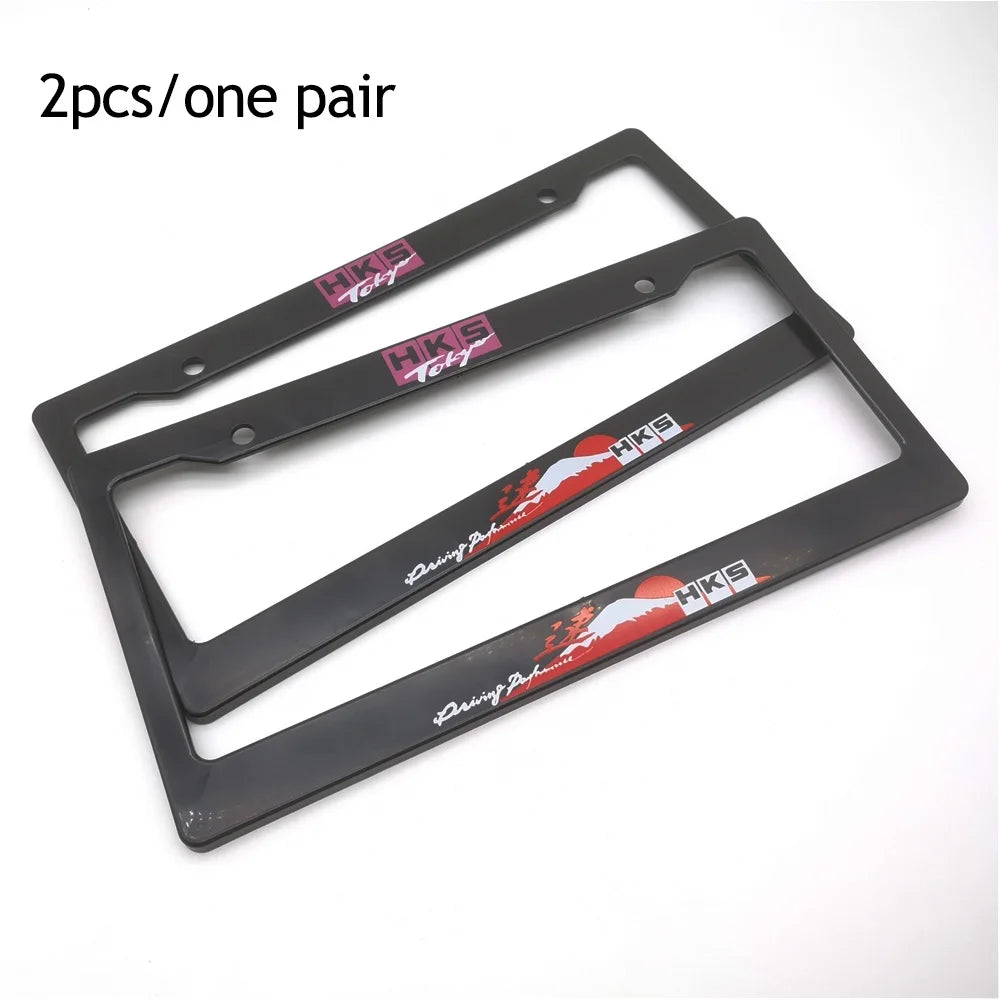 Two black license plate frames with red and white decals for JDM racing style decoration