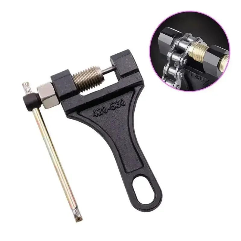 A black universal chain breaker tool with a threaded shaft and a lever mechanism for removing motorcycle, bicycle, or ATV cha