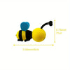 A yellow bee-shaped antenna decoration with blue wings and black body.