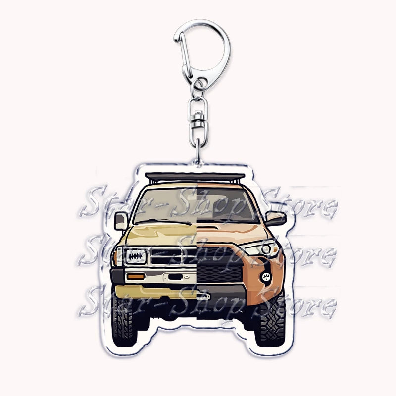Silver acrylic keychain featuring a detailed model of a yellow off-road truck.